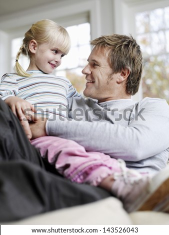 aminul islam nirob add photo daughter sits on dads lap