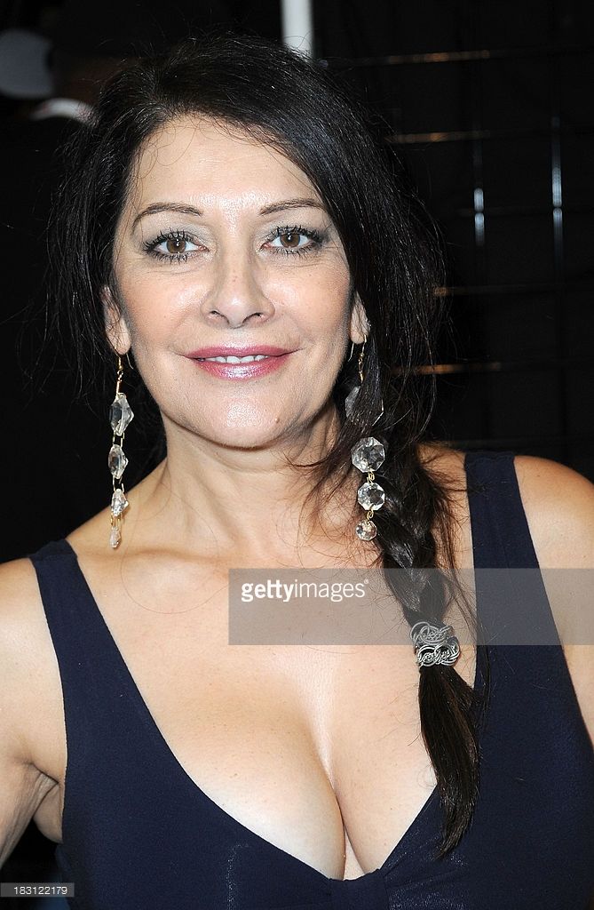 aparna vanga recommends marina sirtis breasts pic