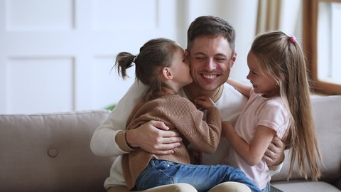 daughter sitting on daddys lap