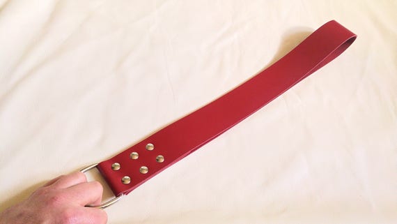 danielle carriere recommends belt spanking clips pic