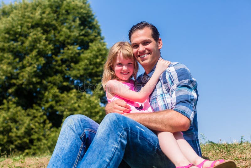 andre paraskevas share daughter sits on dads lap photos