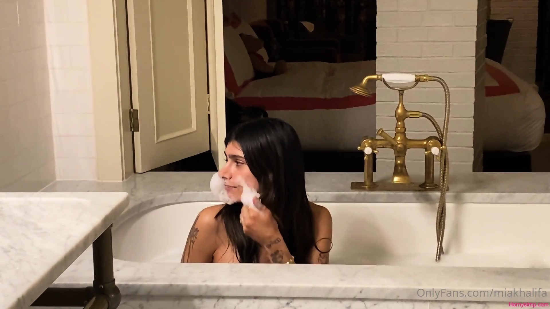 candace heathington add mia khalifa bath tub photo