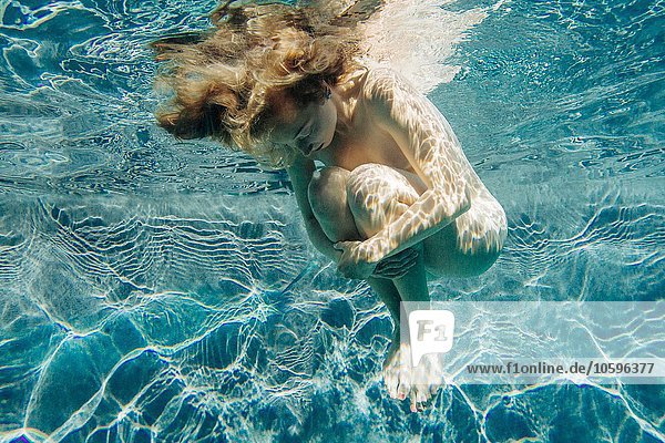 brian ginther add nude women underwater photo